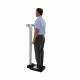 Health o Meter 502 Series Primary Care Scale with Integrated Digital Height Rod - Patient Measuring their Weight