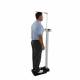 Health o Meter 502 Series Primary Care Scale with Integrated Digital Height Rod - Patient Measuring their Height and Weight